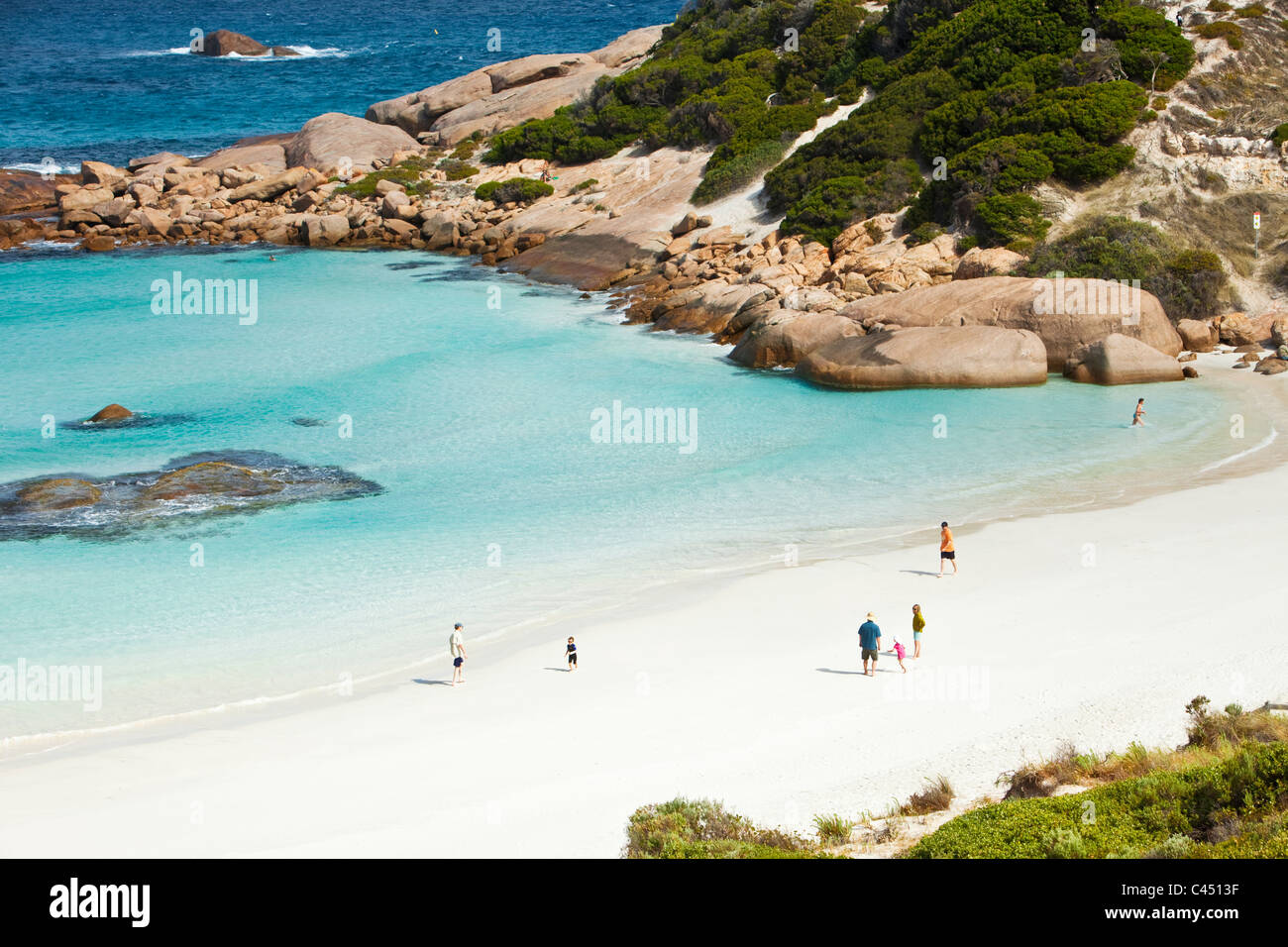 Les nageurs au crépuscule Cove. Esperance, Australie occidentale, Australie Banque D'Images