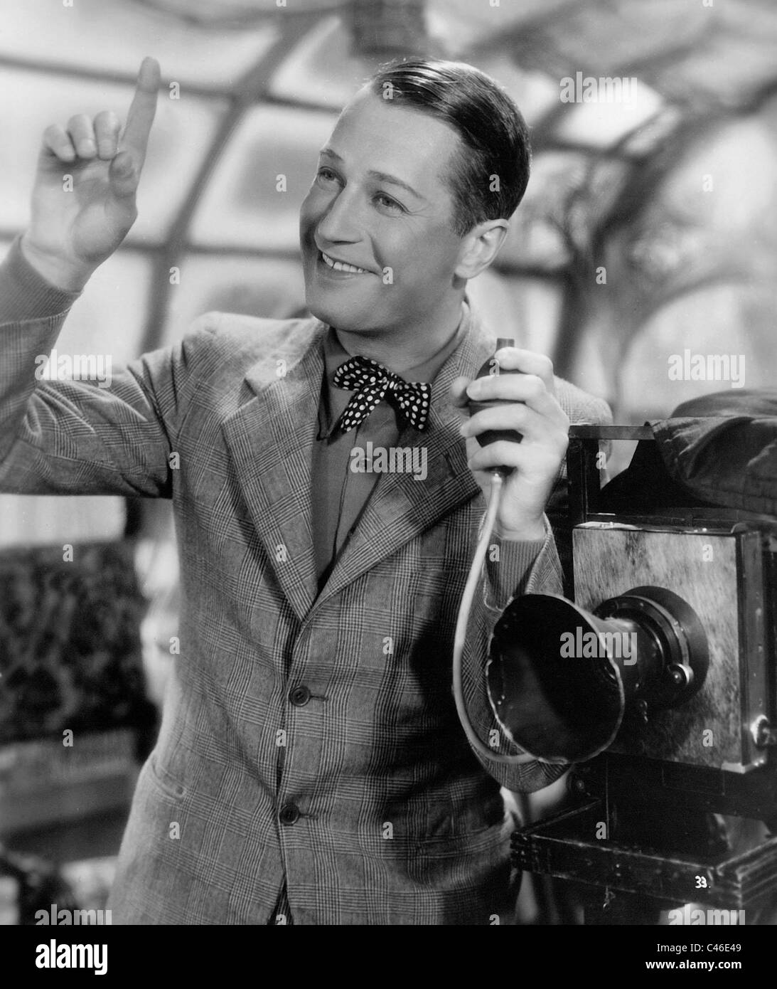Maurice Chevalier dans "la façon d'amour' Banque D'Images