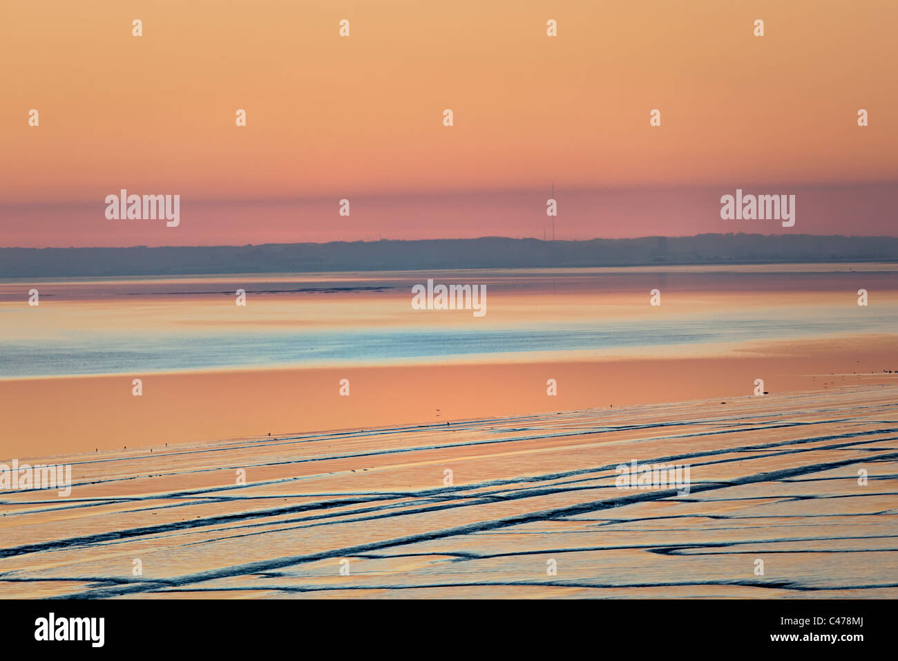 Coucher de soleil sur la plage et les vasières à Goldcliff près de Newport Gwent Wales UK Banque D'Images