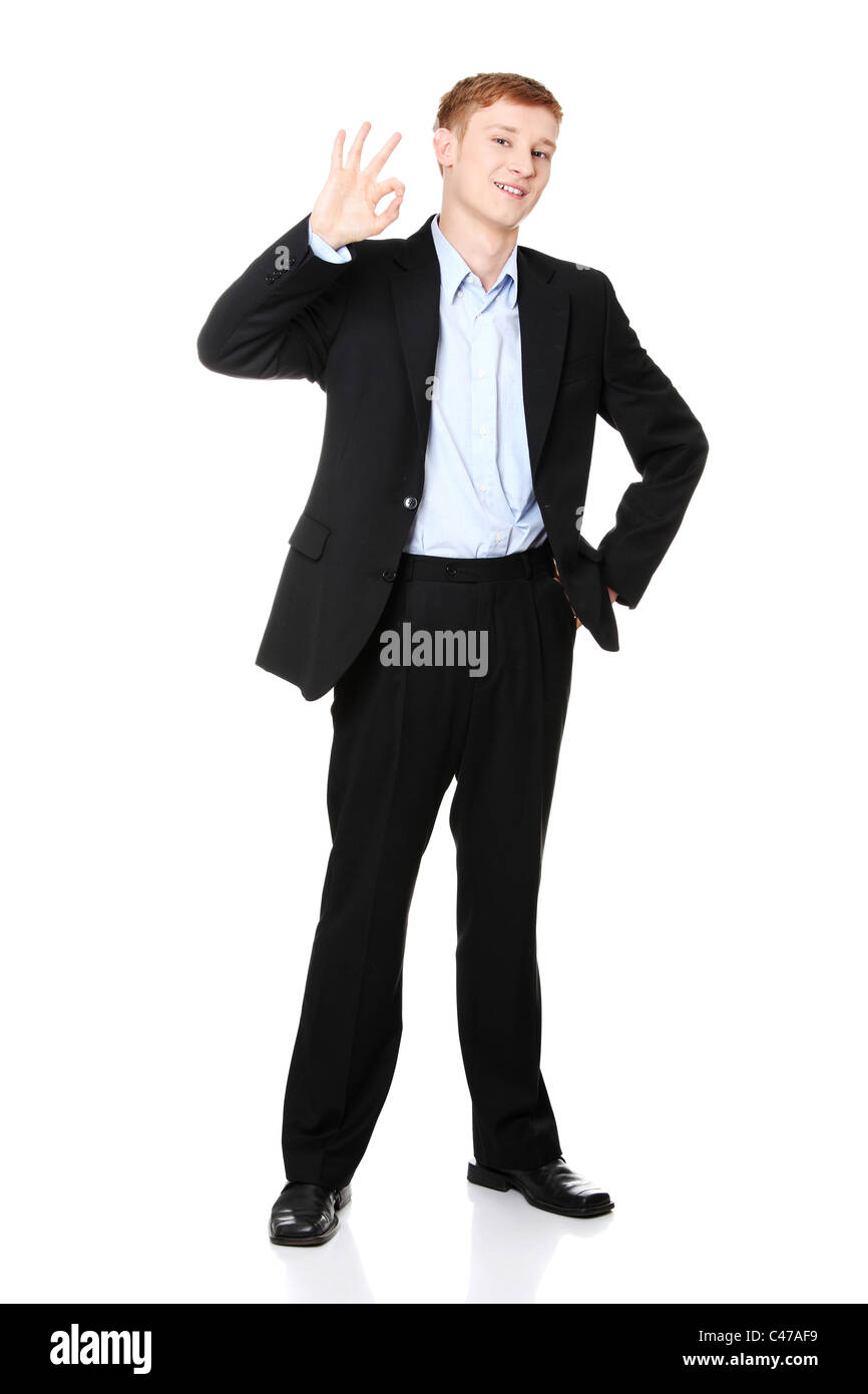 Portrait of young handsome businessman gesturing, perfect Banque D'Images