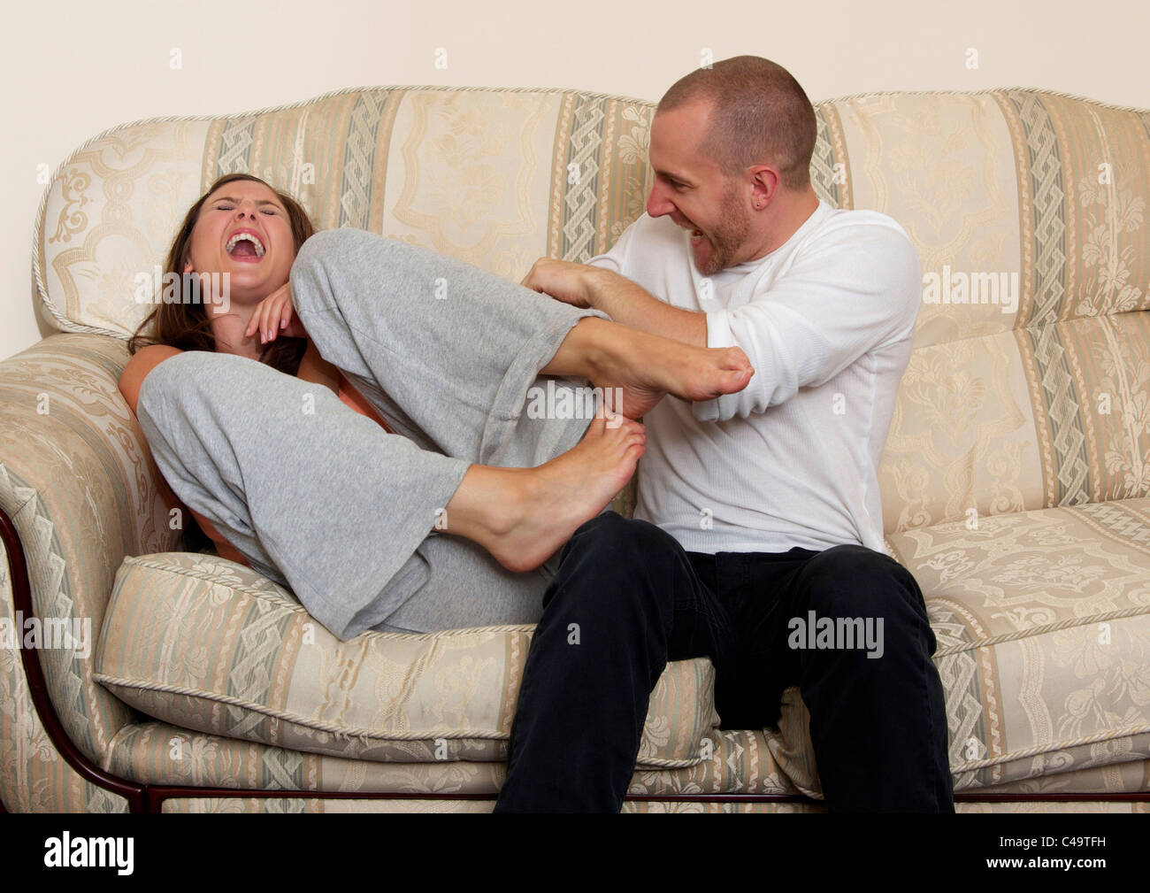 Homme Femme tickling Banque D'Images