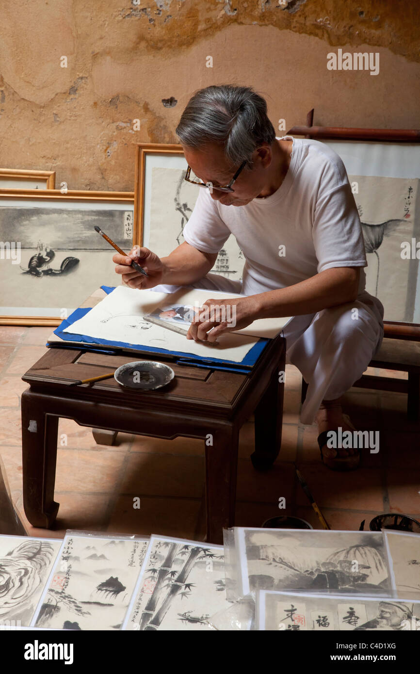 Artiste peintre chinois au travail Banque D'Images