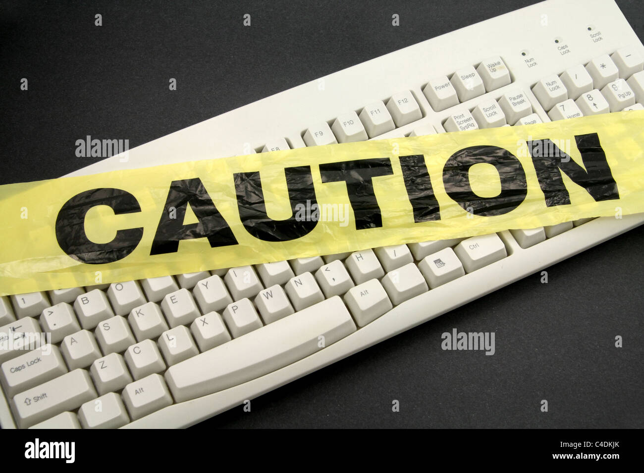 Bande de protection en plastique et d'un clavier, de criminalité informatique Banque D'Images