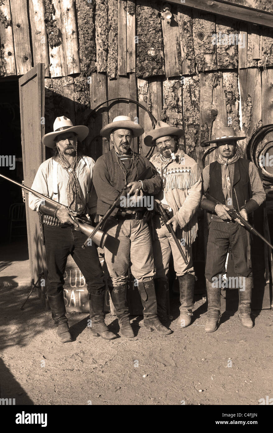 Cowboys avec des fusils Banque D'Images