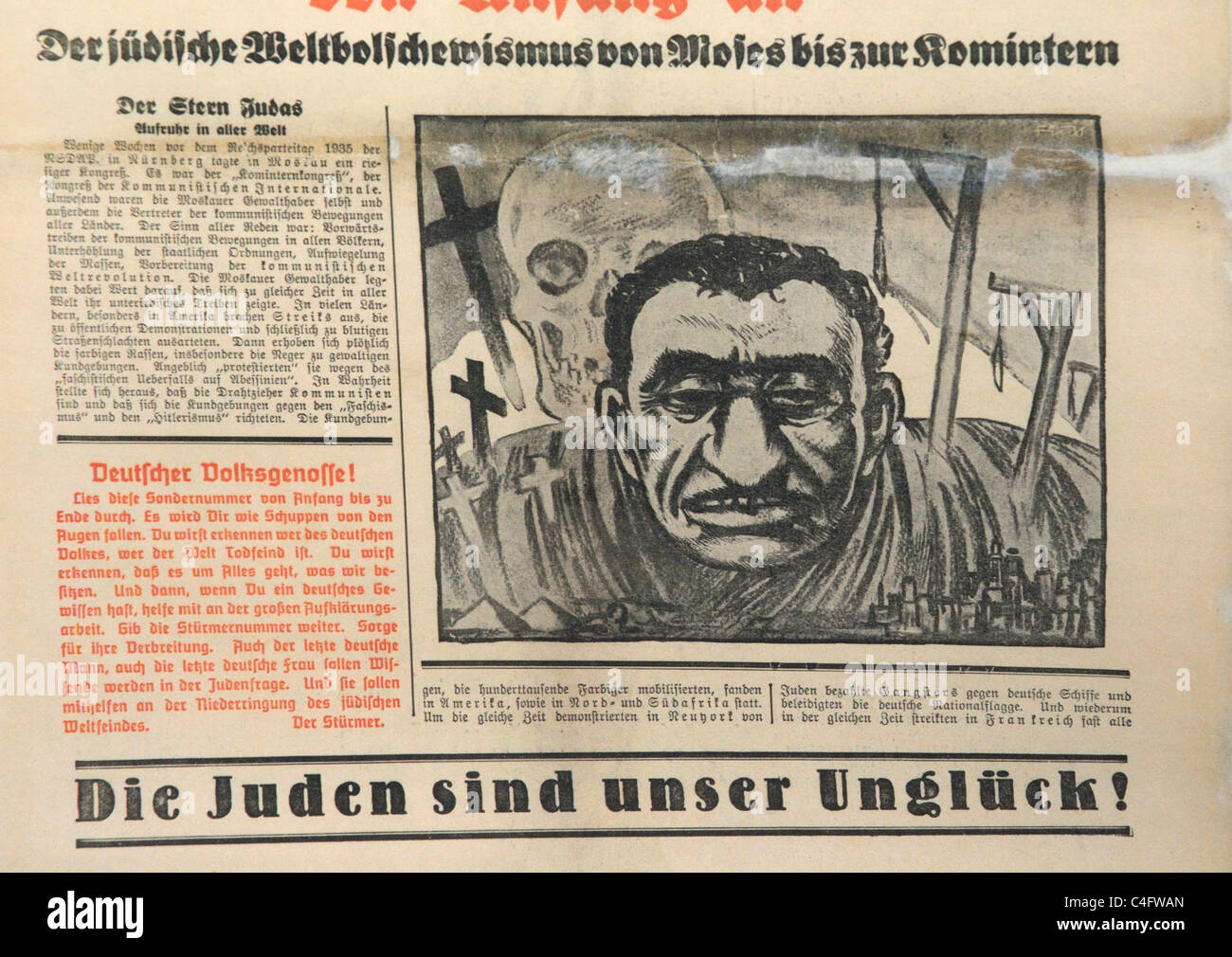 Une caricature d'un juif et le titre "Les juifs sont notre malheur" dans le journal Die nazis Sturmer Banque D'Images