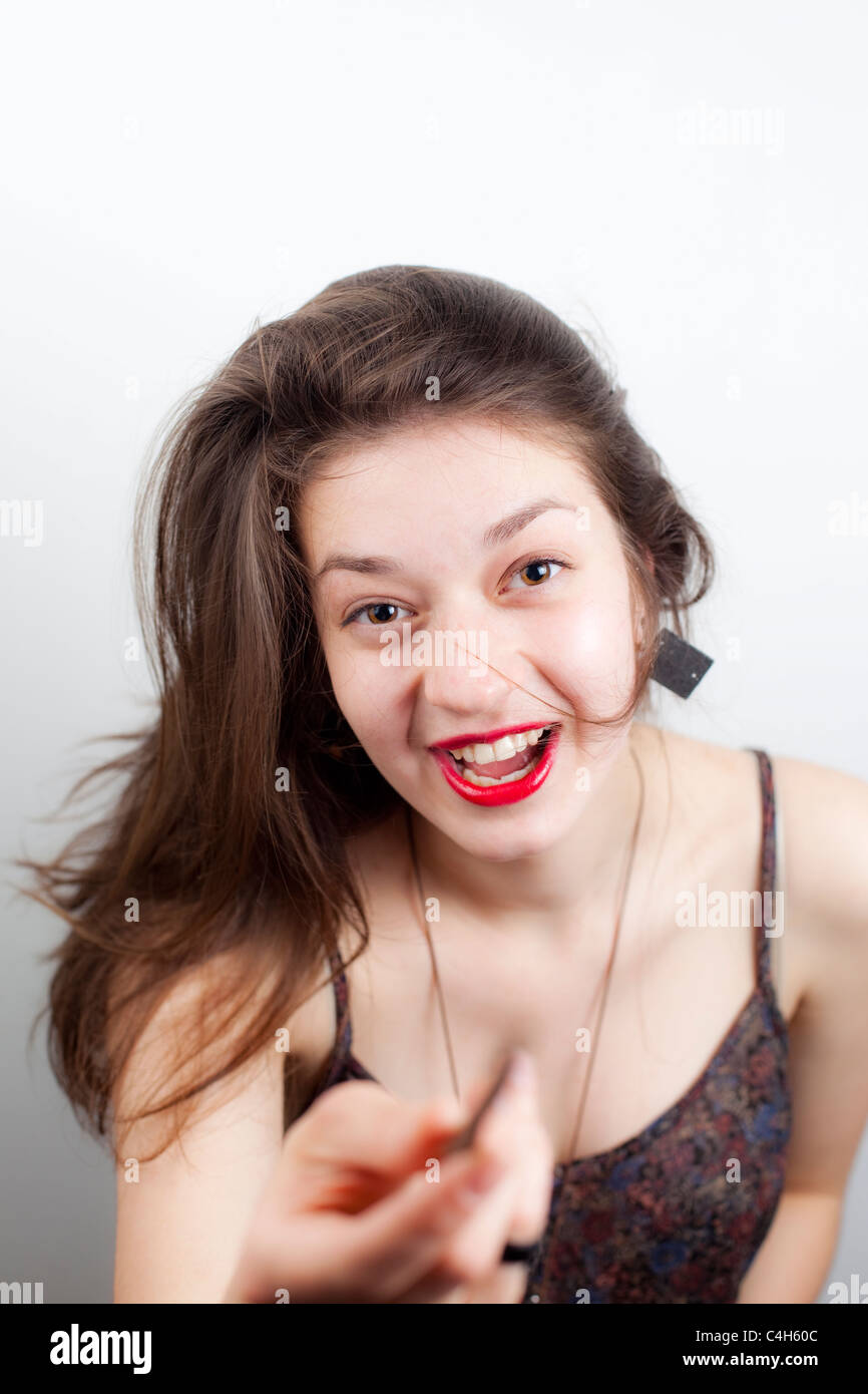 Portrait Portrait of young woman laughing, London, England, UK Banque D'Images