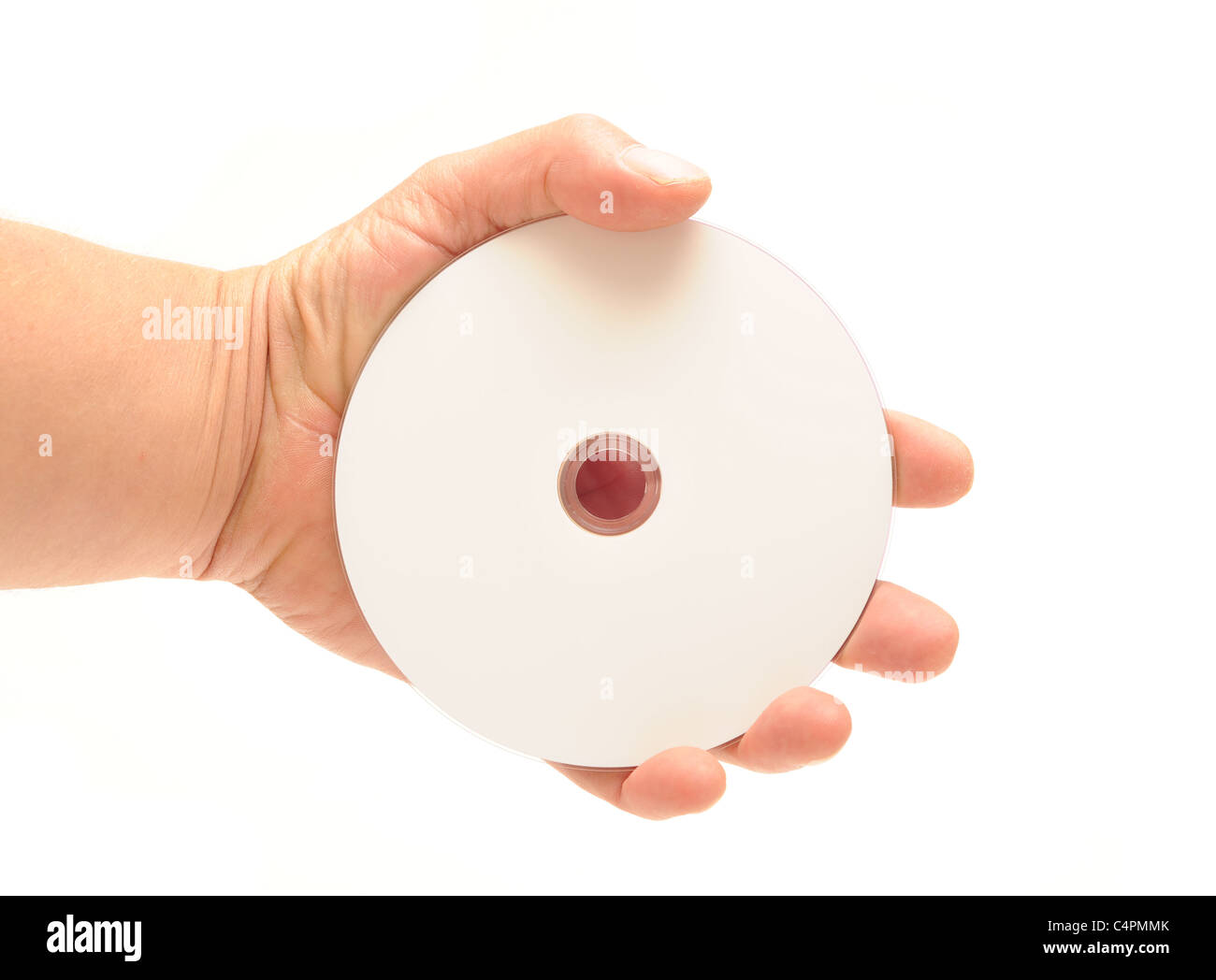 Photographie d'un CD/DVD d'être tenue par une main humaine Banque D'Images