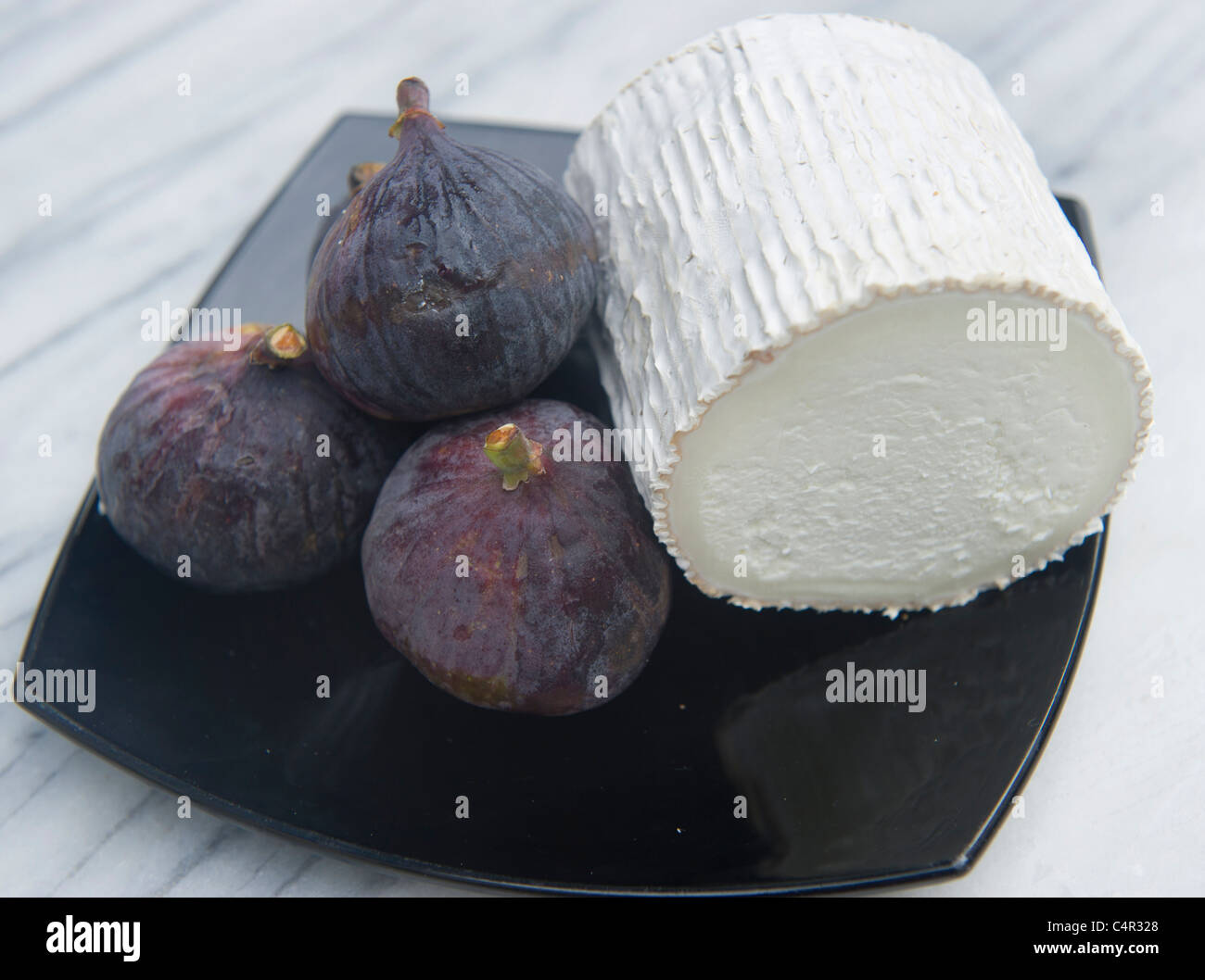 Figues et fromage de chèvre Banque D'Images
