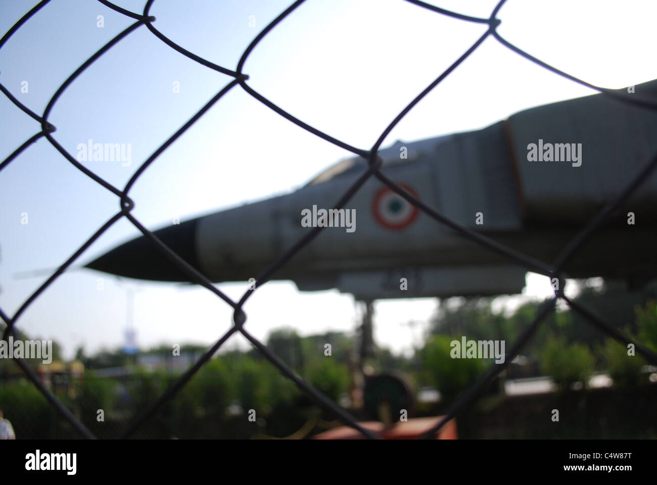 Avion de chasse avec fence Banque D'Images