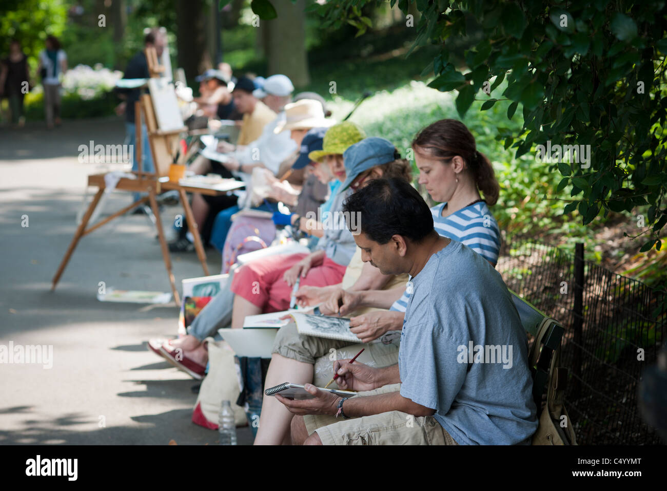 Les artistes travaillent sur leur toile" dans Central Park à New York lors d'une peinture de plein air class Banque D'Images
