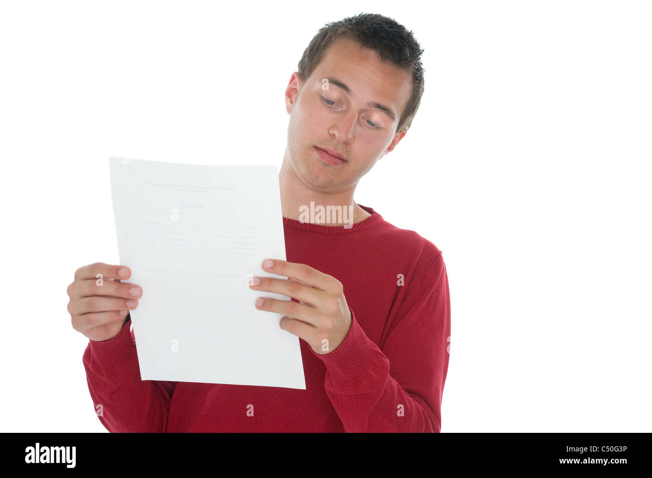 Jeune homme avec les résultats d'examen paper Banque D'Images