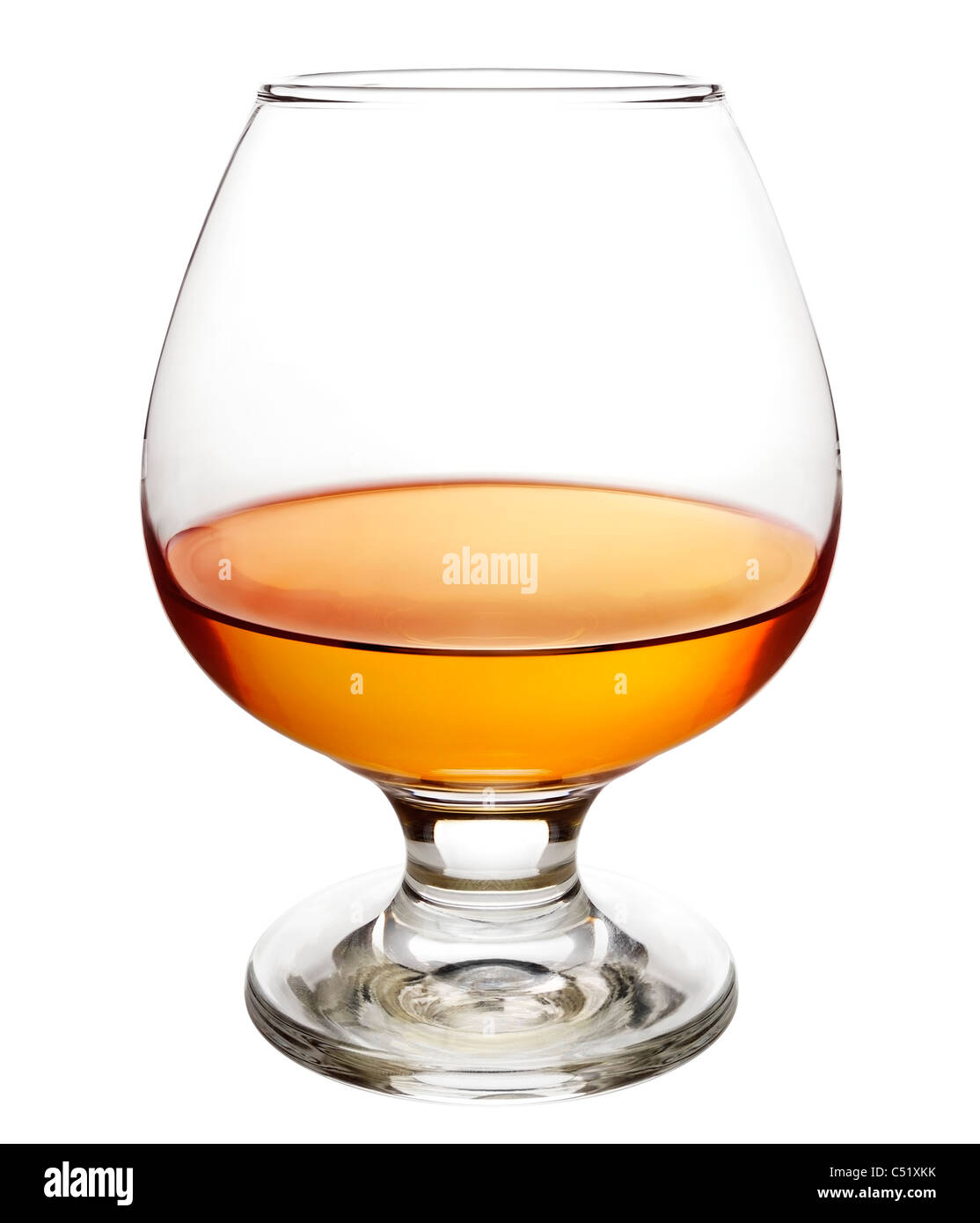Cognac dans un petit verre de brandy Banque D'Images