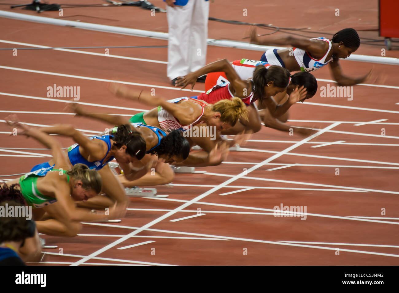 PÉKIN, CHINE : début du sprint olympique féminin du 100 mètres Banque D'Images