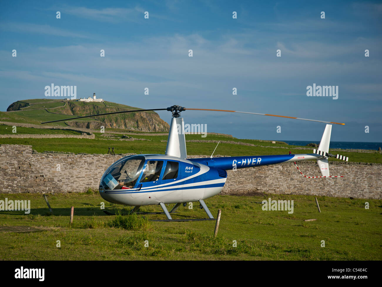 Robinson R44 Raven II' Établissement"Sumburgh, Hélicoptère à Îles Shetland. 7548 SCO Banque D'Images