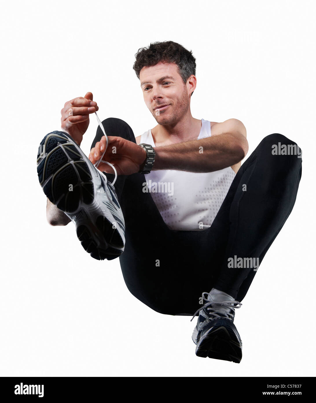 Attacher ses lacets homme Banque D'Images