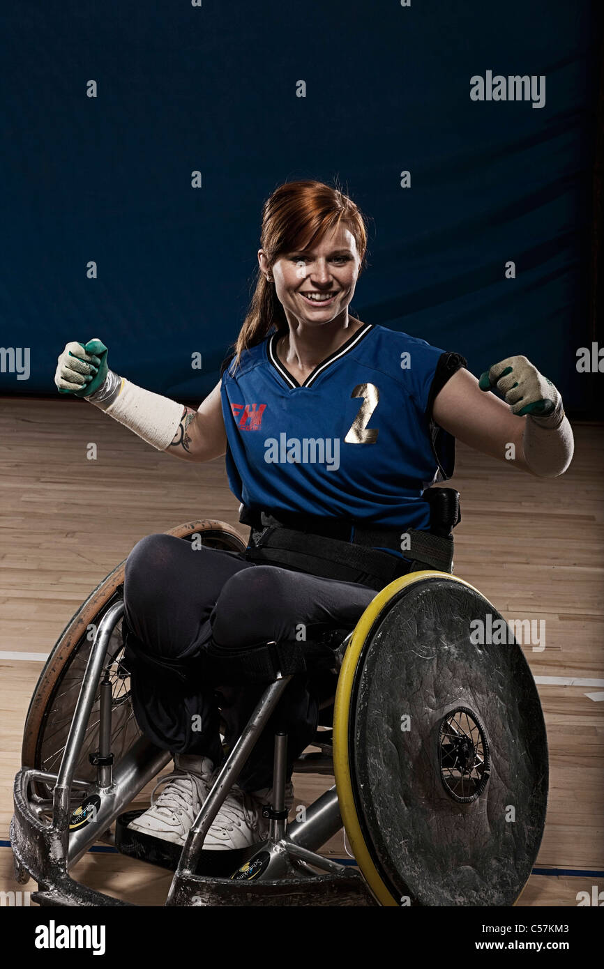 Para rugby player cheering in wheelchair Banque D'Images