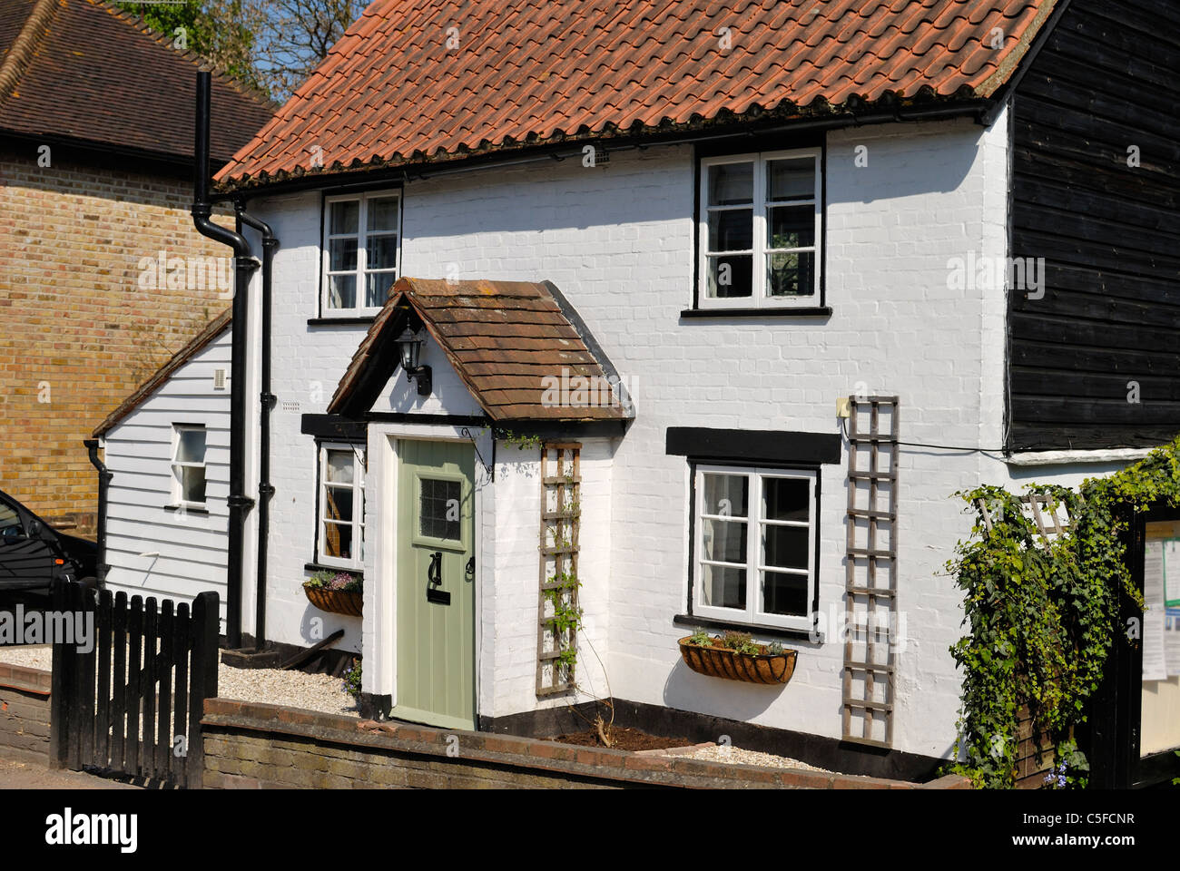 Cottage de brique peints en blanc à Shoreham. Kent. L'Angleterre Banque D'Images