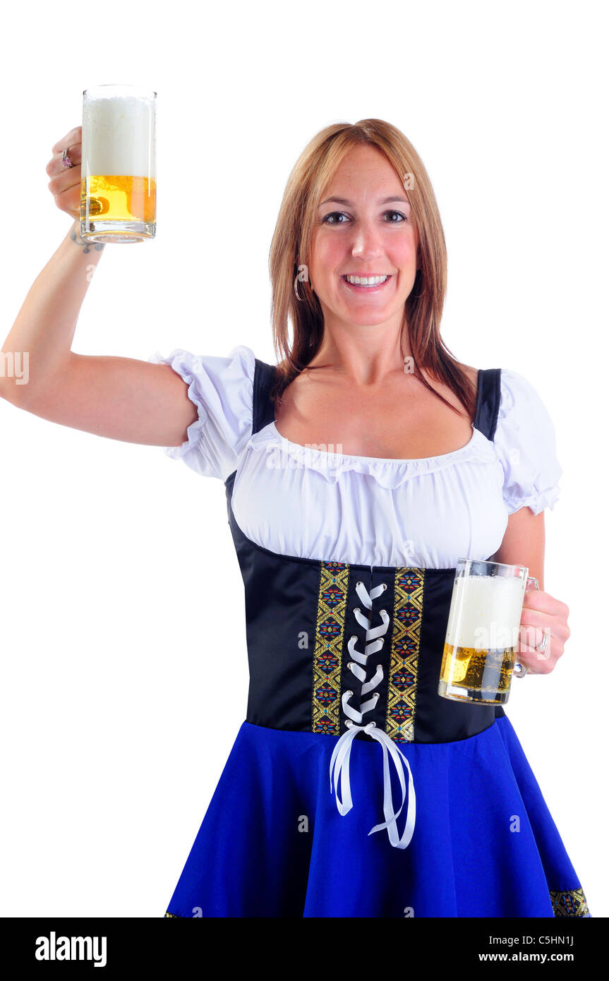 Belle femme portant un costume pour l'Oktoberfest Dirndl traditionnel servant des fêtes de la bière Banque D'Images