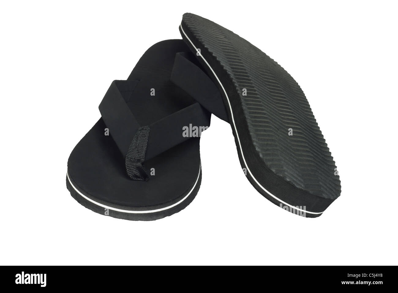 Paire de tongs noir chaussures occasionnels sur fond blanc Banque D'Images