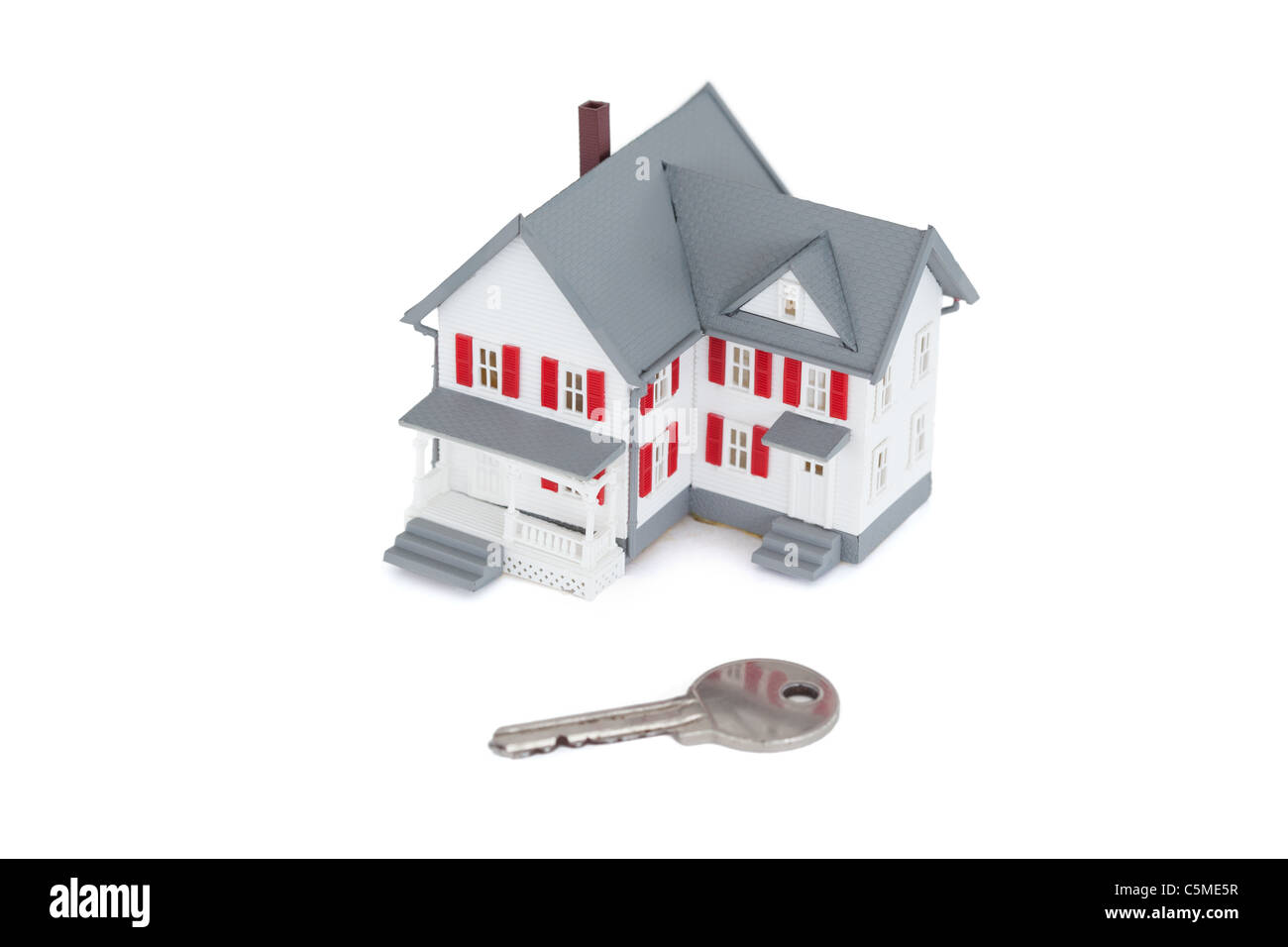 Maison miniature avec une clé Banque D'Images