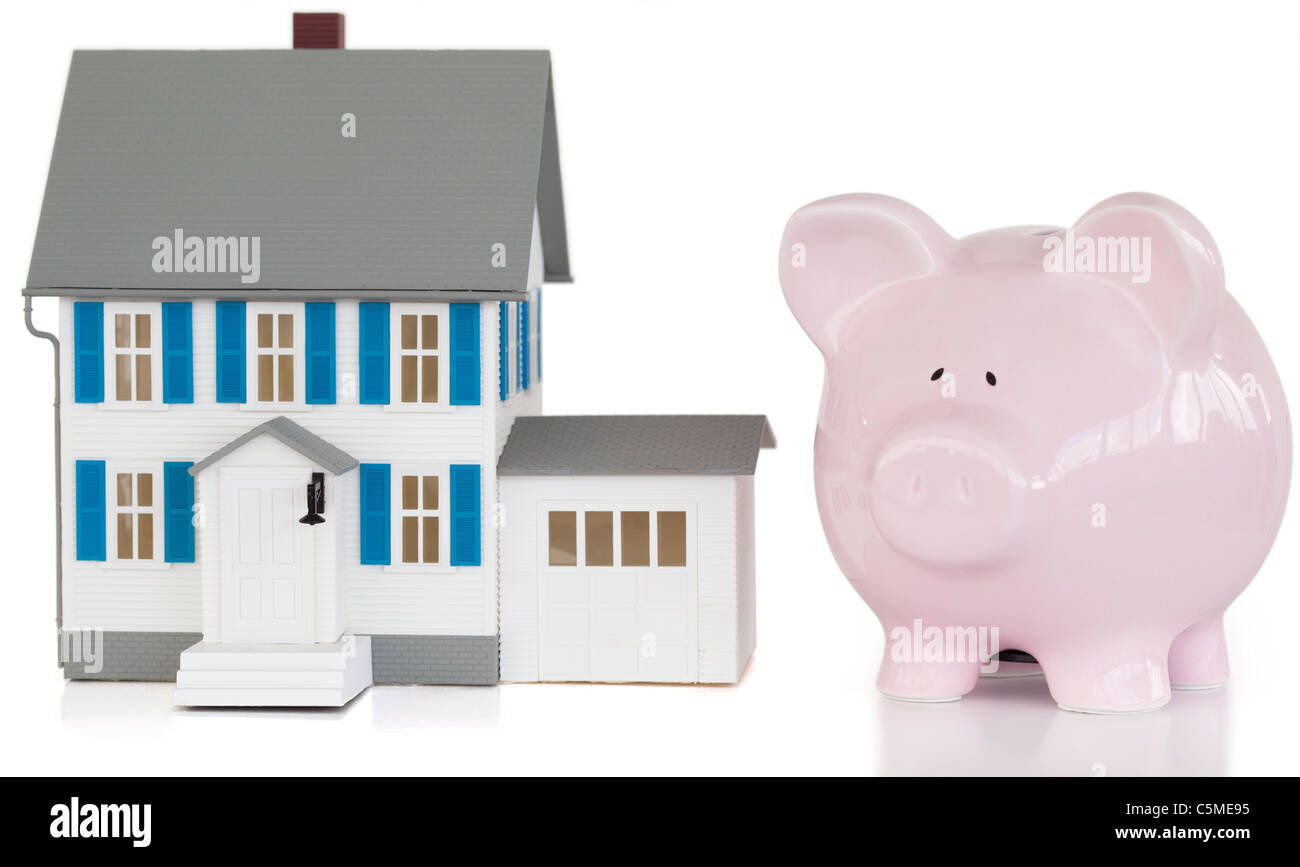 House and piggy bank Banque D'Images