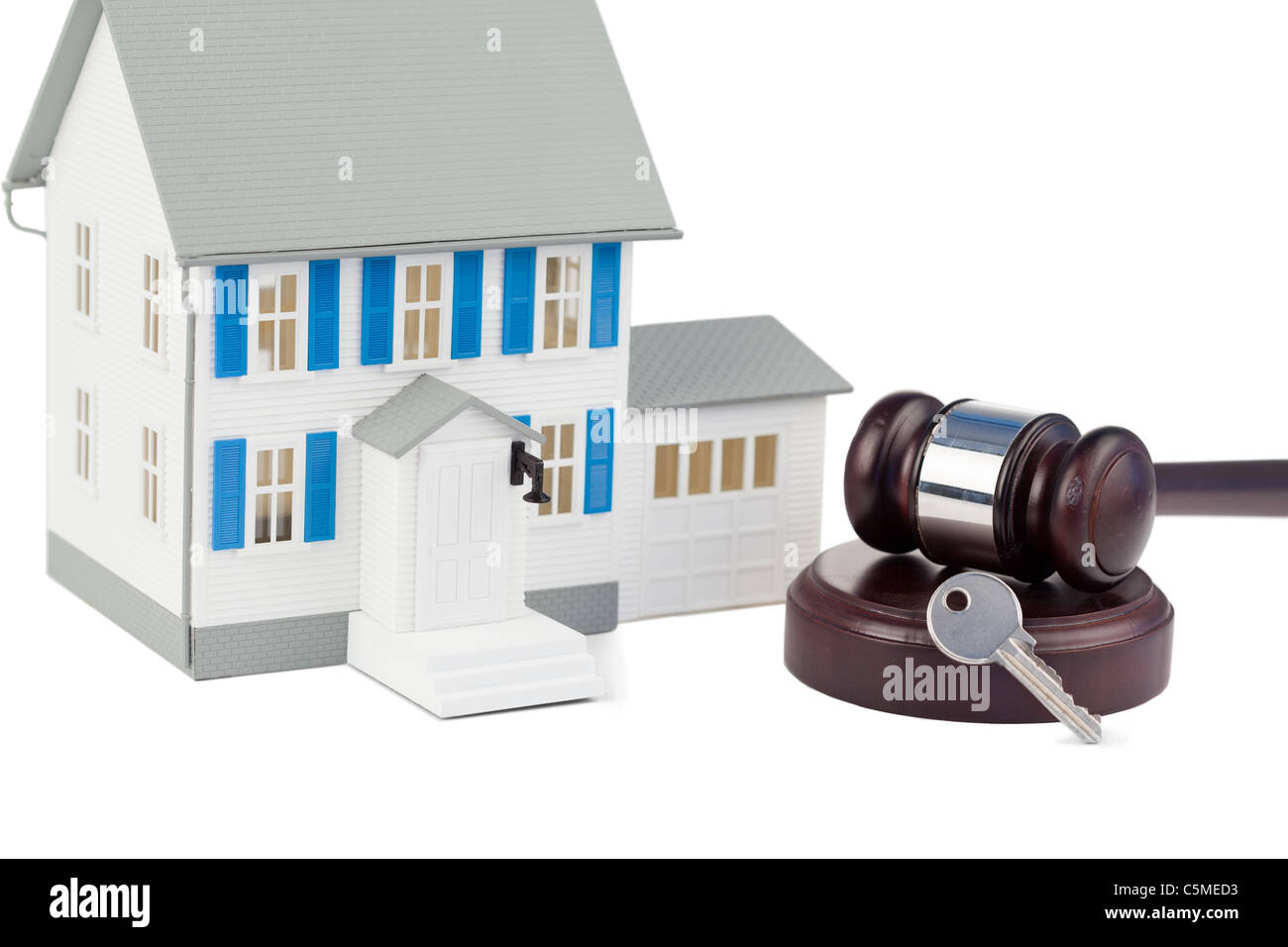 Gray toy house model avec une clé et un brown a donné Banque D'Images