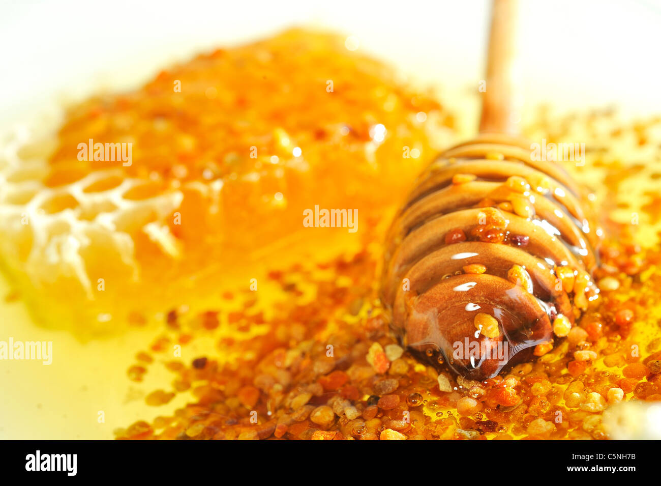 Le miel avec du stick Banque D'Images