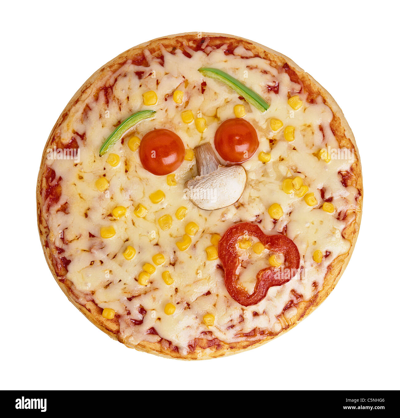 Une pizza avec les garnitures à l'image d'un visage Banque D'Images