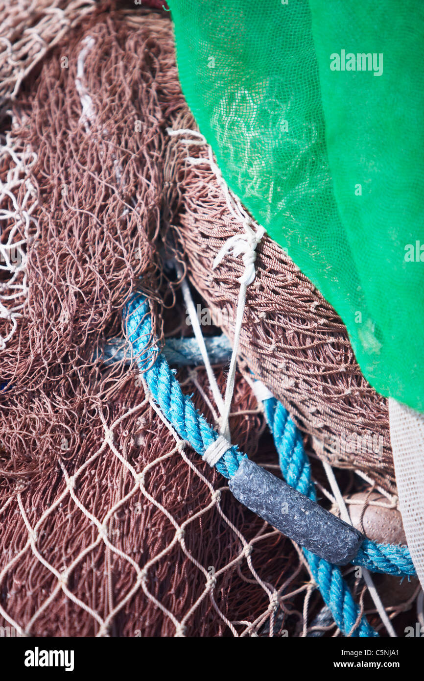 Close-up filet de pêche commerciale et des cordes Banque D'Images