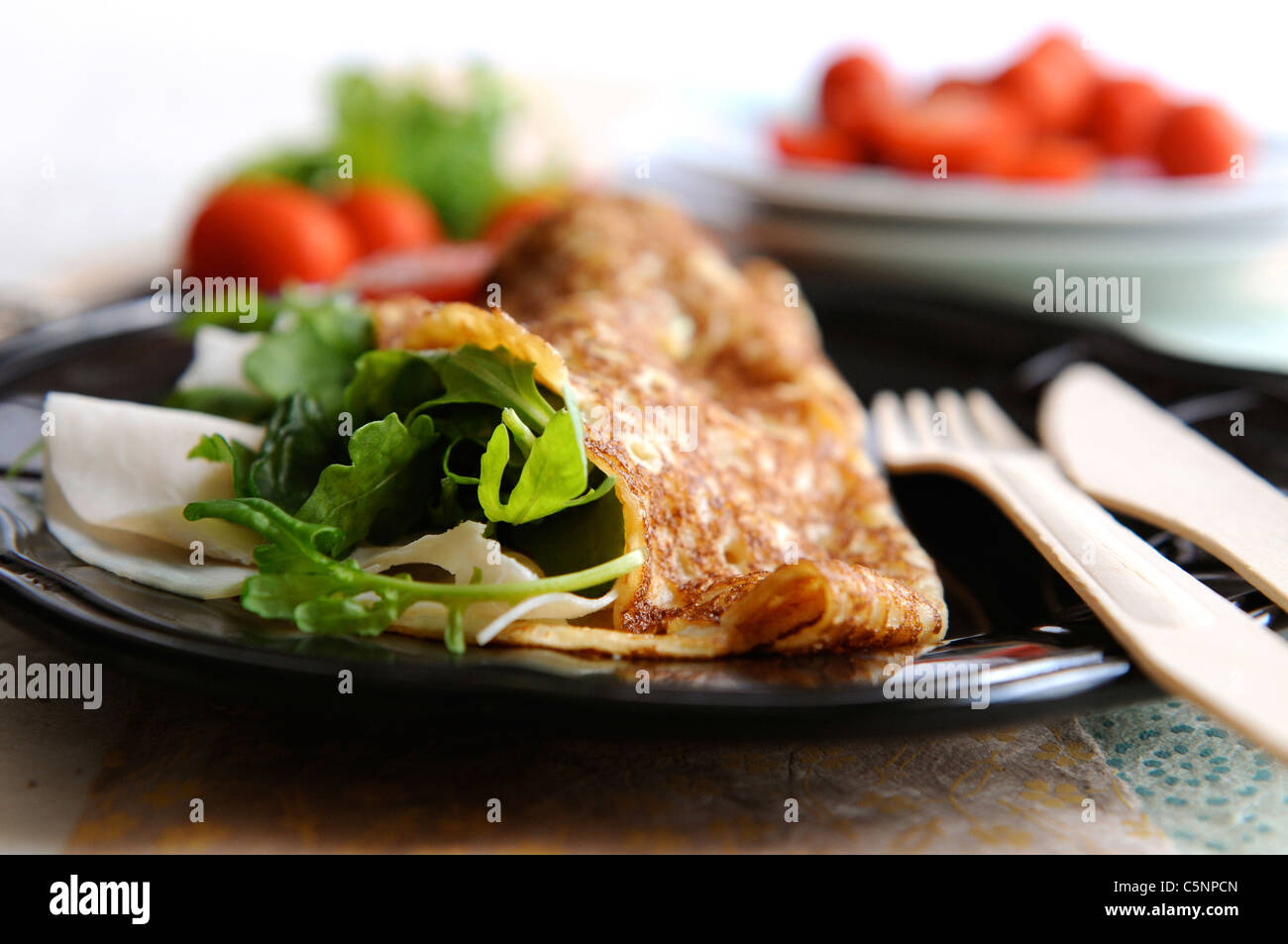 Crêpes au jambon et fromage et à la roquette Banque D'Images