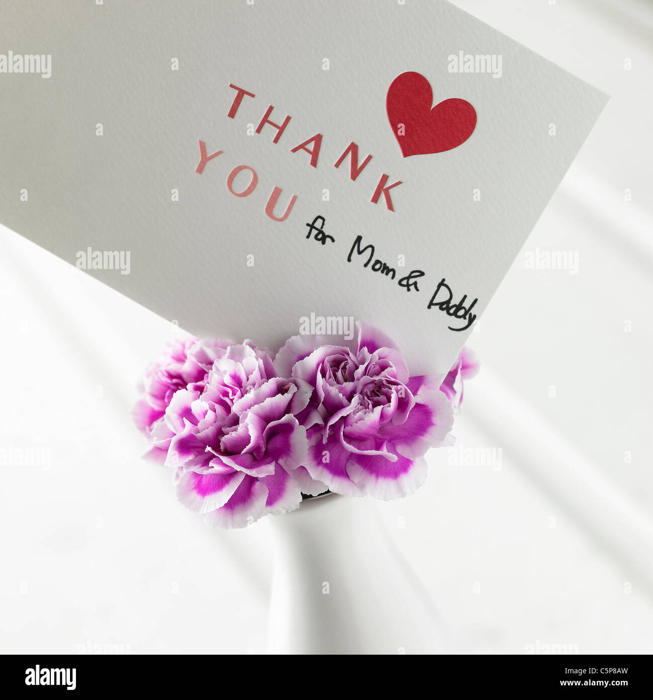 Vase à fleurs et carte de remerciement Banque D'Images
