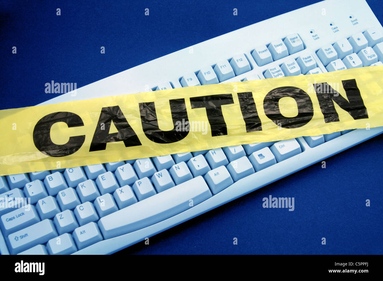 Bande de protection en plastique et d'un clavier, de criminalité informatique Banque D'Images