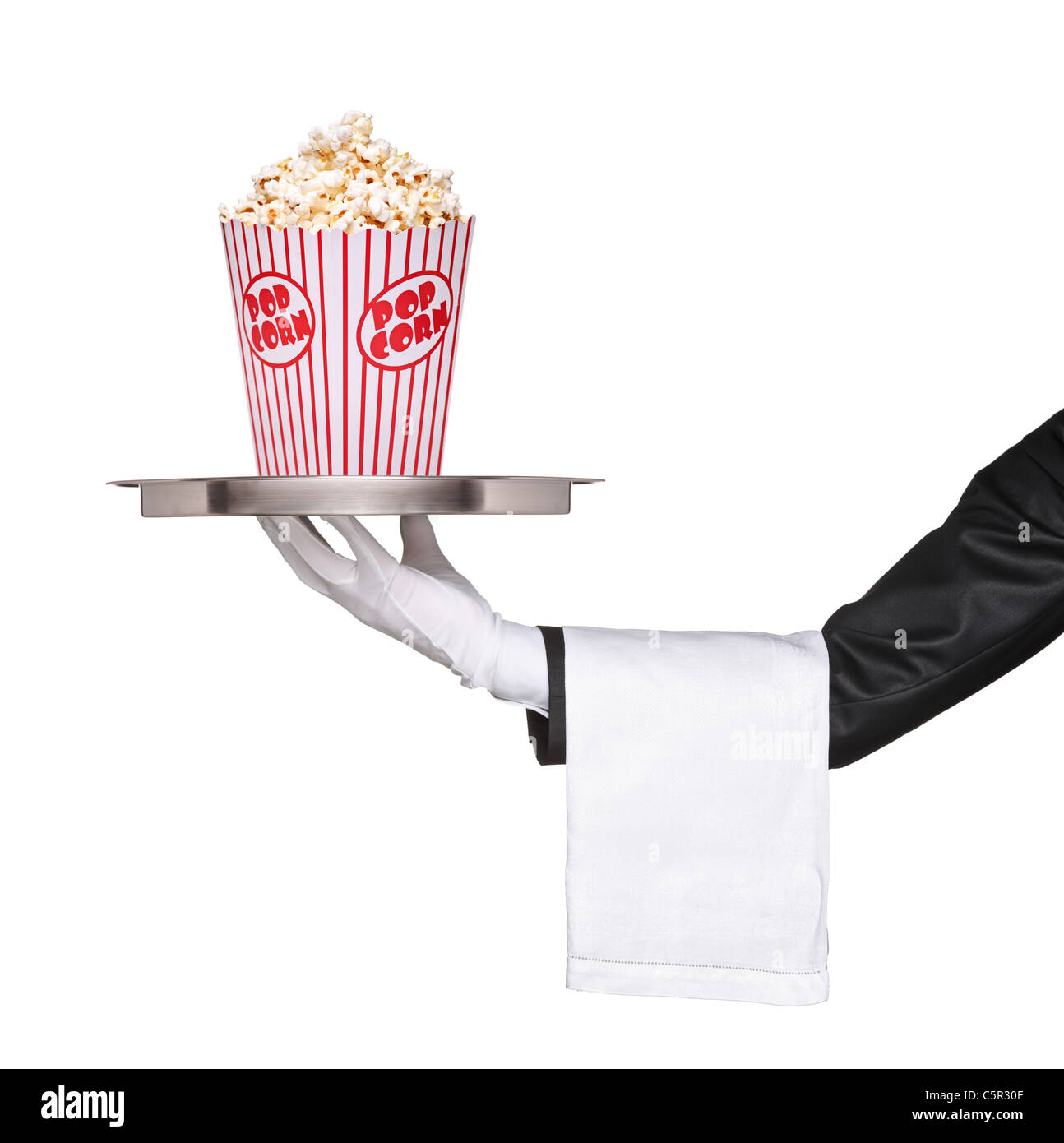 Un waiter holding a silver tray with popcorn fort sur elle Banque D'Images