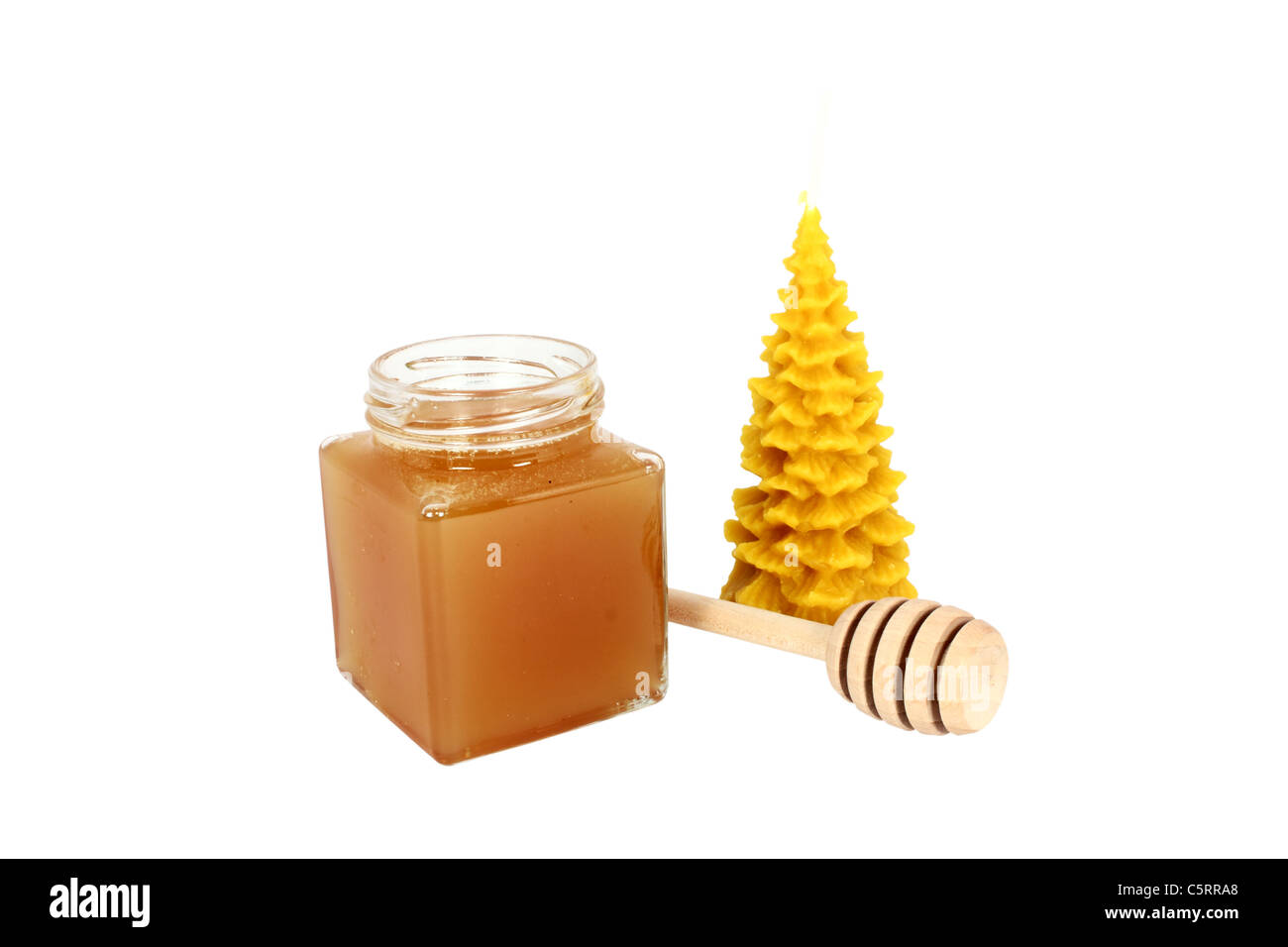 Produits naturels faits de miel abeilles avec balancier et bougie de cire Banque D'Images