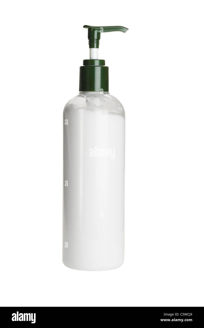 Bouteille de crème hydratante debout sur fond blanc Banque D'Images