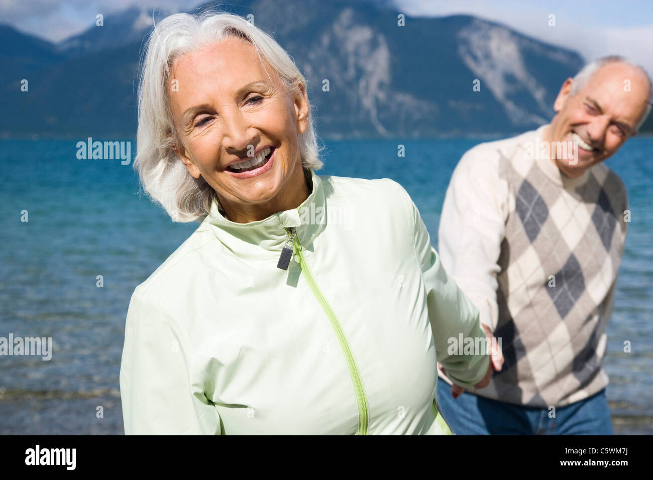 Spain, Senior couple walking hand in hand Banque D'Images