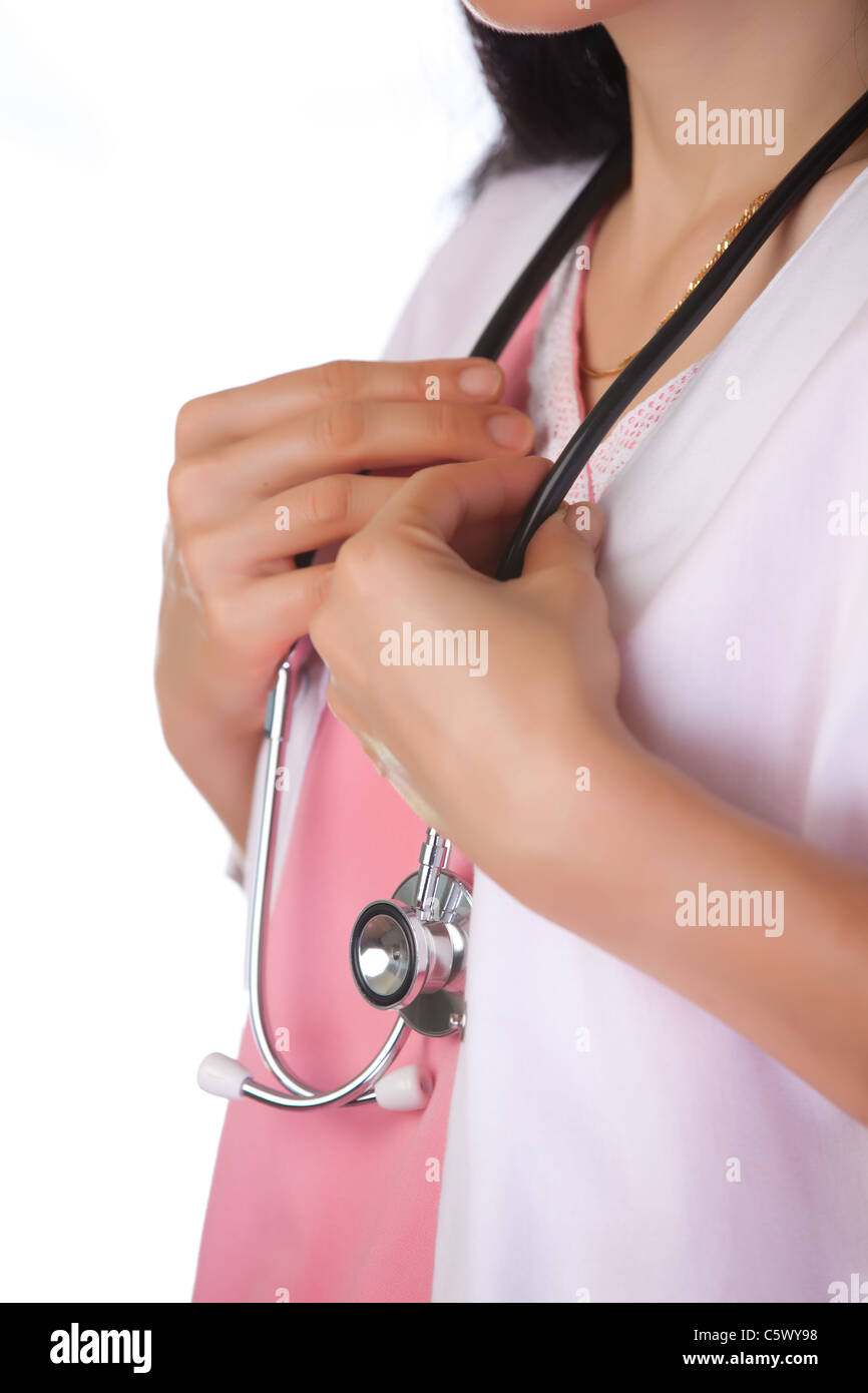 Travailleur de la santé féminine, holding stethoscope Banque D'Images
