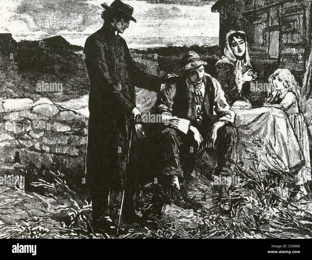 La pauvreté un prêtre irlandais pauvres un confort famille irlandaise à propos de 1845 Banque D'Images