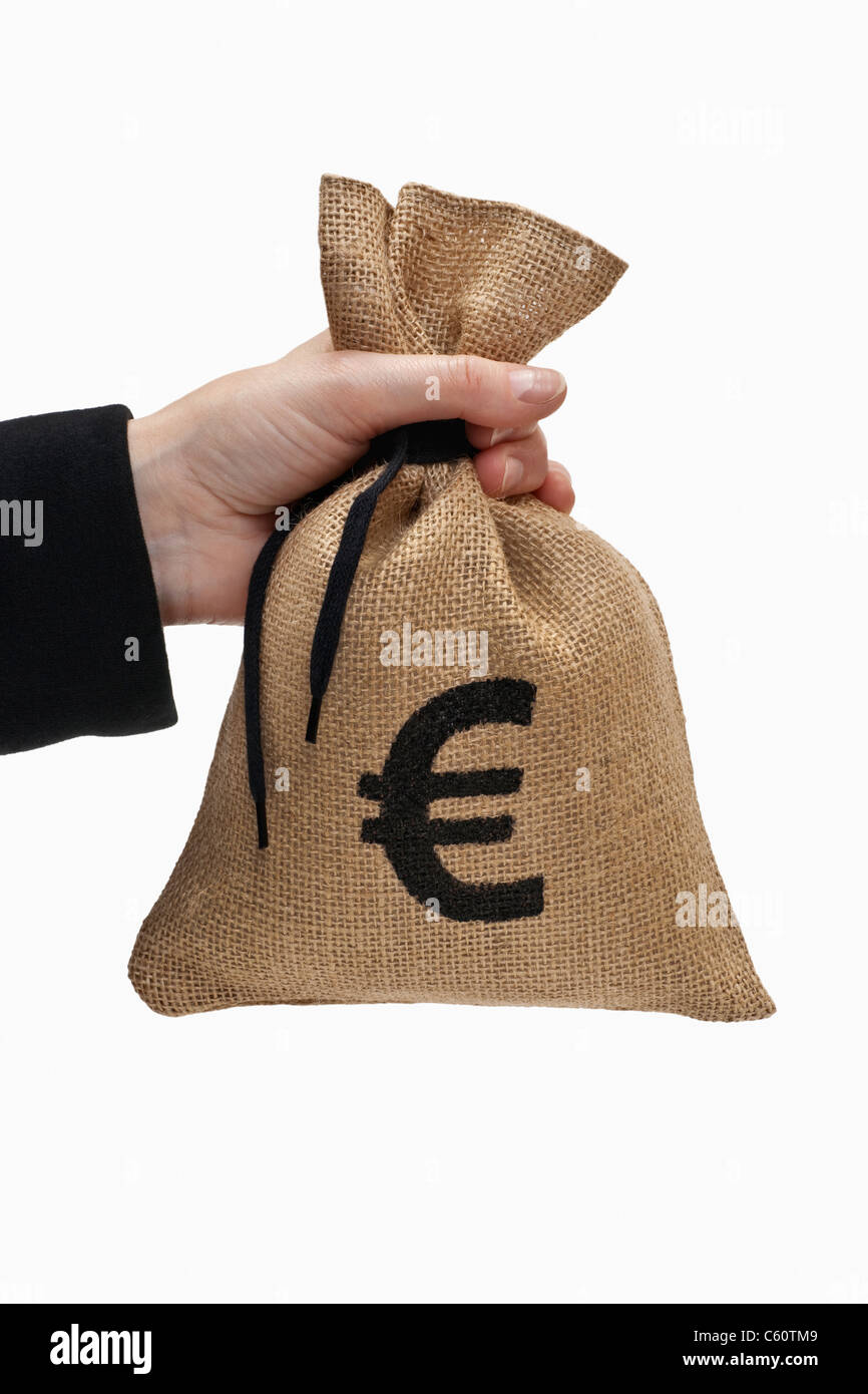 Geldsack Euro-Symbol wird ein mit der part gehalten | un sac avec de l'argent signe euro sont tenues à la main Banque D'Images