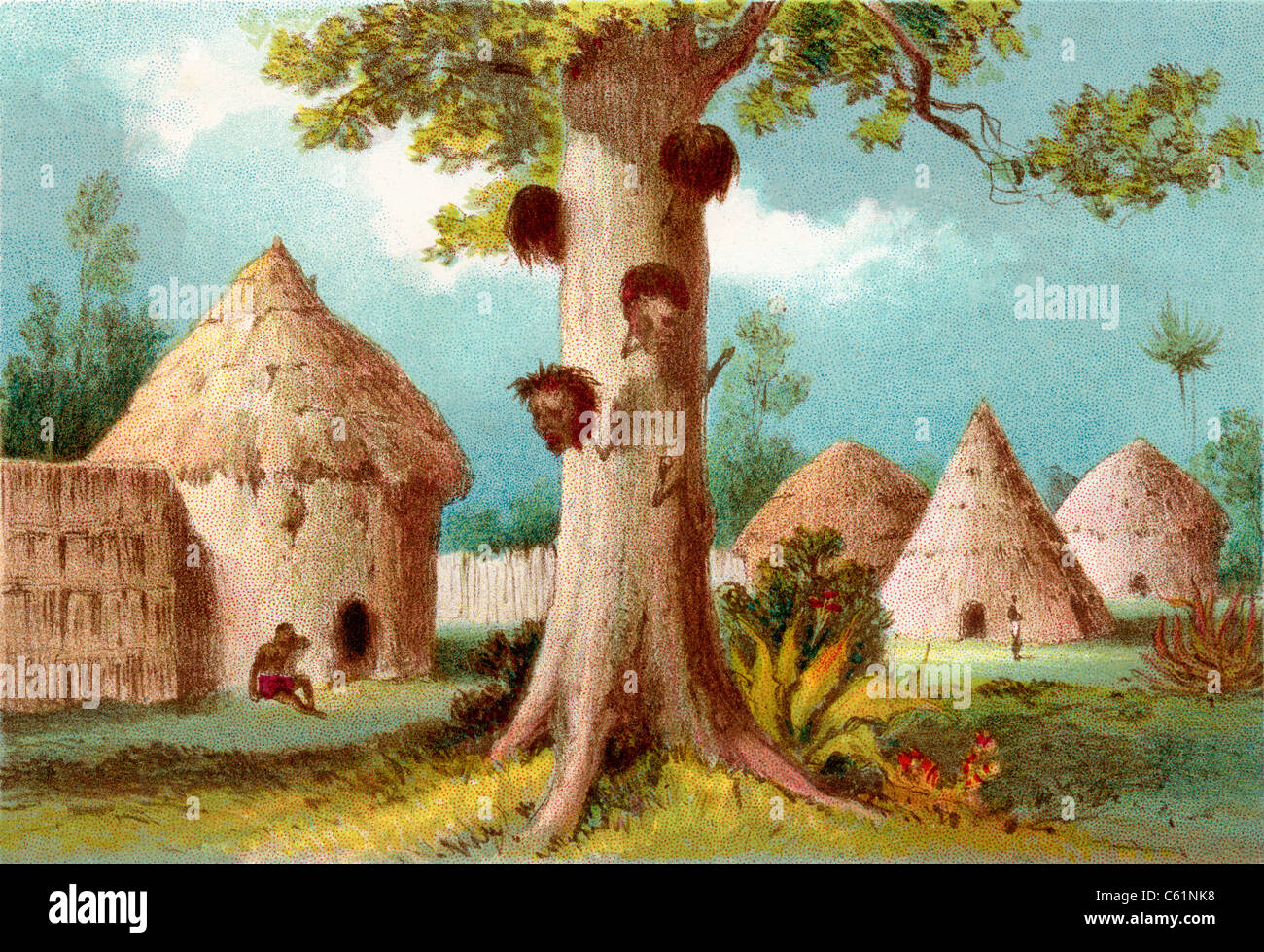 Un arbre avec la guerre des chefs décapités à brochettes c'est le tronc, dans un village africain au 19e siècle. Banque D'Images Un arbre avec la guerre des chefs décapités à brochettes c'est le tronc, dans un village africain au 19e siècle. Banque D'Images