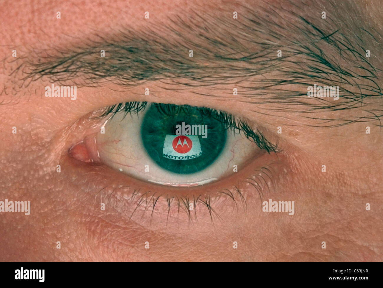 Logo de l'entreprise reflète dans l'Œil Banque D'Images