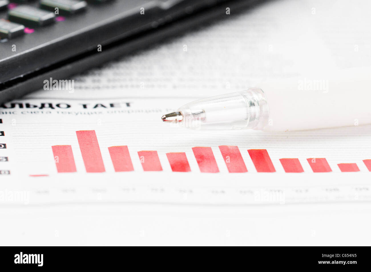 Concept d'entreprise : calculatrice, stylo et schéma Banque D'Images