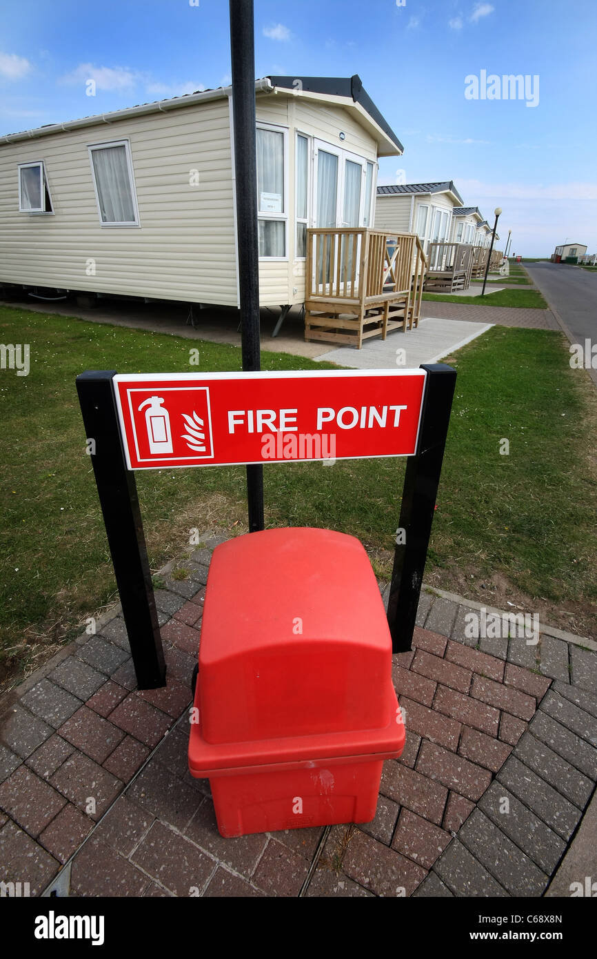 Au point de feu de caravane résidentielle et d'accueil du parc. Banque D'Images