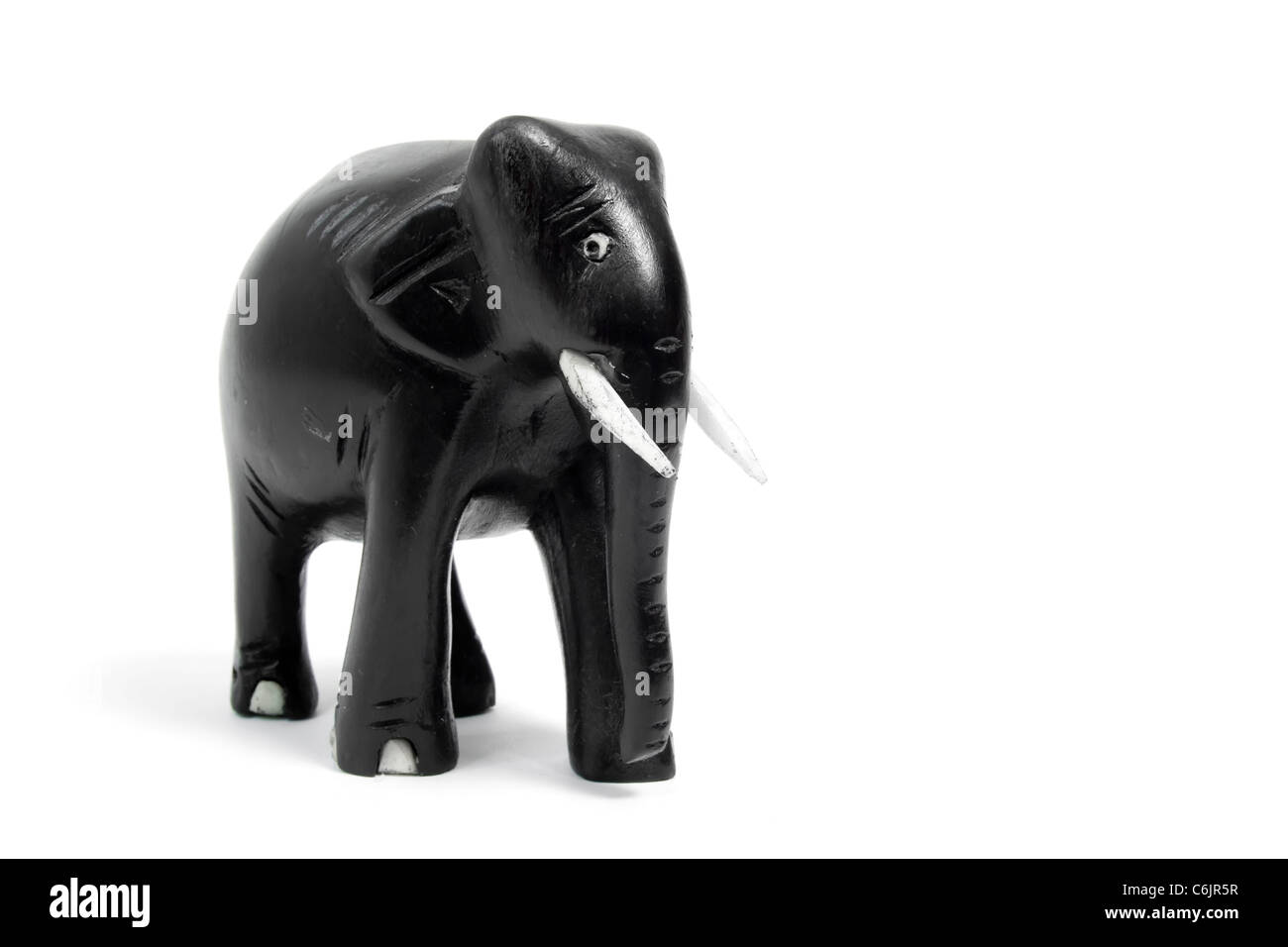 Éléphant jouet en bois, isolé sur blanc Banque D'Images