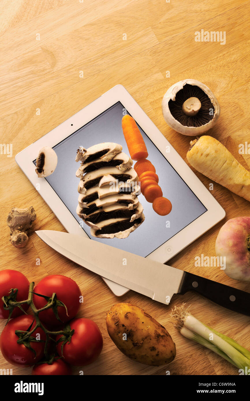 Apple Ipad Comme Planche A Decouper Legumes Couteau Photo Stock Alamy