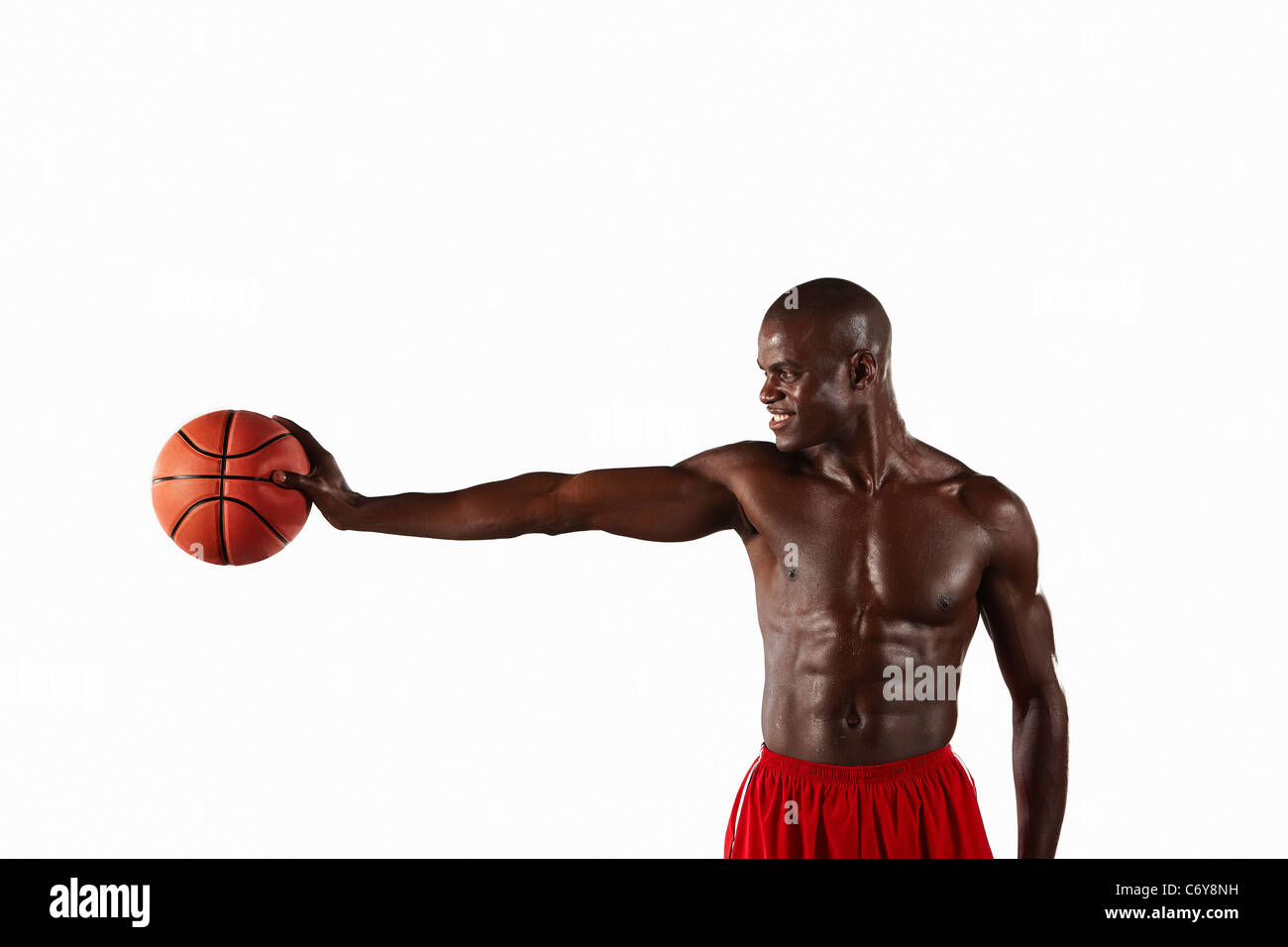 Man holding basketball Banque D'Images