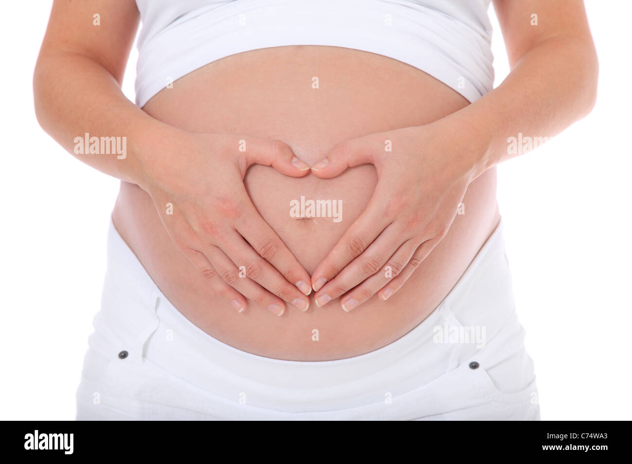 Femme enceinte. Le tout sur fond blanc. Banque D'Images