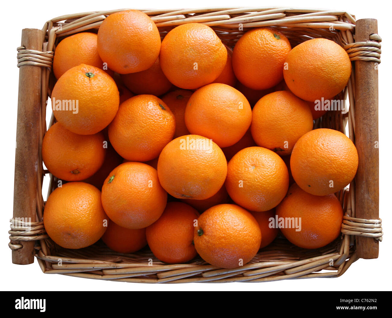 Un panier d'oranges, dentelle against white background Banque D'Images