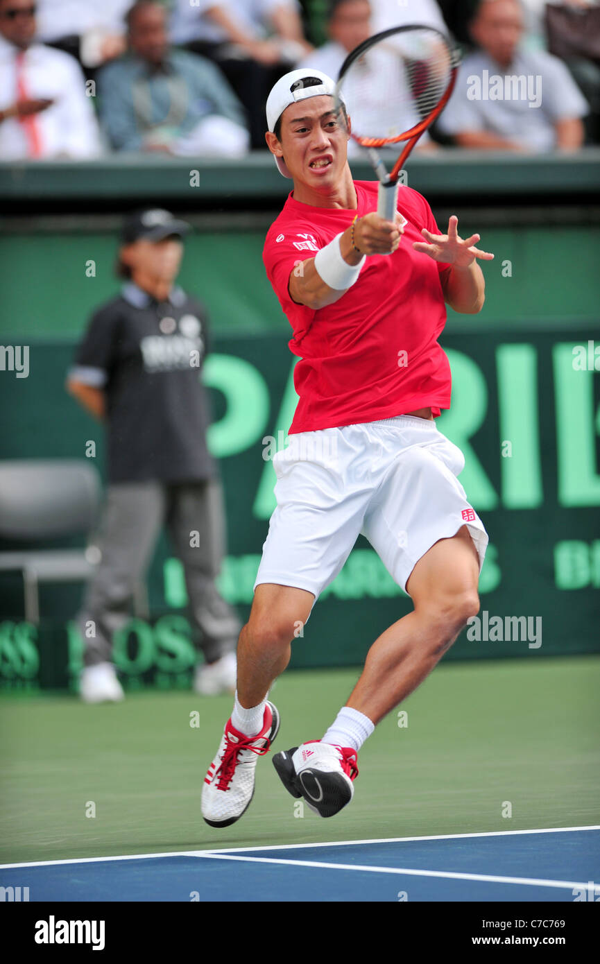 Kei Nishikori (JPN) effectue au cours de la Coupe Davis par BNP Paribas 2011 Championnat du monde. Banque D'Images