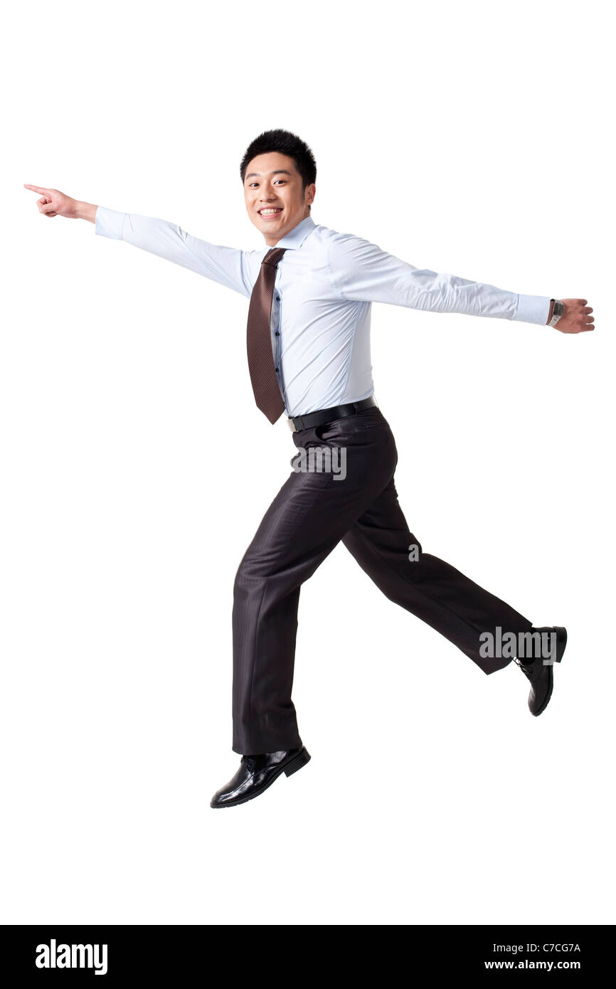 Portrait of a Businessman Jumping Up Banque D'Images